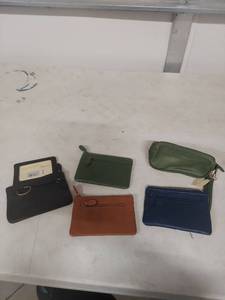 lot 1412 image: Rolfs Essentials Leather Coin Pouch Collection