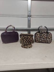 lot 1424 image: Animal Print Cosmetic Bags Collection