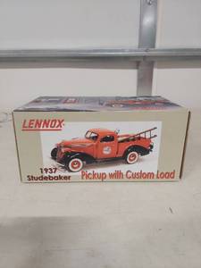 lot 1458 image: Lennox 1937 Studebaker Pickup Die-Cast Model