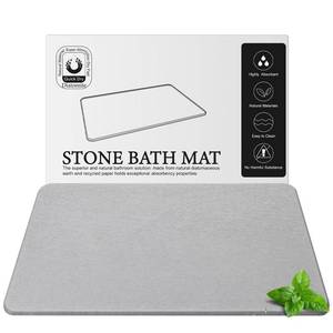 lot 1163 image: Greenturf Diatomite Stone Bath Mat, Premium Natural Diatomaceous Earth Bathtub Drying Mats for Bathroom Floor (23.6 x 15.4 Light Grey) - Retail $29
