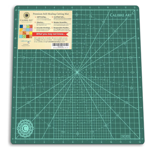 lot 9892 image: Rotating Self Healing Cutting Mat 14x14 (13 Grid), Perfect for Quilting & Art Projects - Retail $0