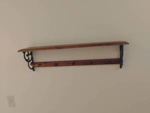 lot 915 image: Wooden and Wrought Iron Shelf with Hooks.  8 x 30
