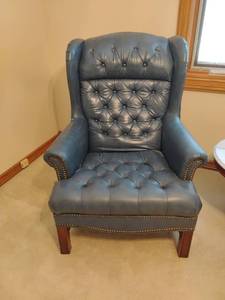 lot 928 image: Blue Leather Highback Chair.  Seat is 19 x 28   Matches lot 930.   Located UPSTAIRS