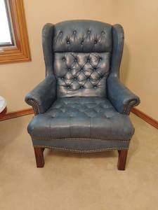 lot 930 image: Blue Leather Highback Chair.   Seat is 19 x 28.  Matches lot 928. Located UPSTAIRS
