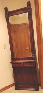 lot 940 image: Antique Hall Tree with Mirror.  Over 100 years old.  80 x 23 x 8.  Located UPSTAIRS