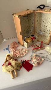 lot 1002 image: Vintage doll case with doll, clothes and accessories