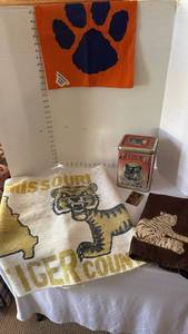 lot 1031 image: Missouri Tiger rug, hand towel and vintage Tiger Chewing Tobacco tin and Tiger rag