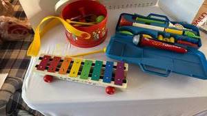 lot 1040 image: Vintage Fisher Price musical instruments