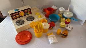 lot 1041 image: Vintage Fisher Price stove, dishes and skillet
