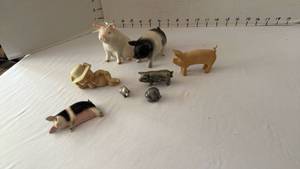 lot 1056 image: Pewter, ceramic and wood pigs including salt & pepper shakers