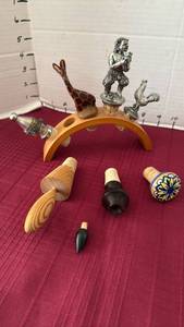 lot 1058 image: Decorative wine stoppers and holder
