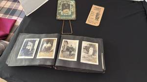 lot 1067 image: Vintage photo album, picture with frame and OshKosh booklet