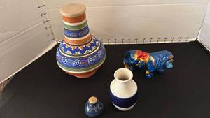 lot 1073 image: Pottery drinking vessel with cup, decorative lion and pottery vase