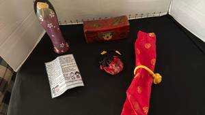 lot 1089 image: Kokeshi doll, Chinese trinket wood box and more