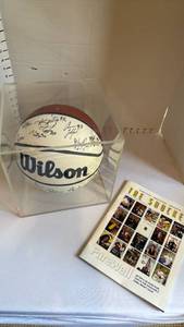 lot 1101 image: Signed Shocker basketball with case and The Shocker magazine 2019