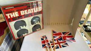 lot 1104 image: Beatles framed album and small British flags