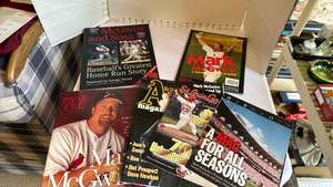 lot 1117 image: Mark McGwire and Sammy Sosa books and Mark McGwire memorabilia