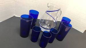 lot 1219 image: Cobalt Blue Glass Tumbler Set and glass pitcher