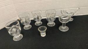 lot 1227 image: Clear Glass egg cups with chicken Face Design, and more