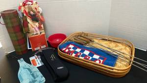 lot 1251 image: Wine bottle koozie, wine bottle gift bags, glass cheese board and bamboo trays with skewers mo