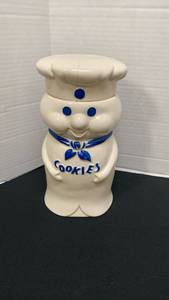 lot 1272 image: Pillsbury Doughboy Cookie Jar 10 inches tall - lid has been repaired