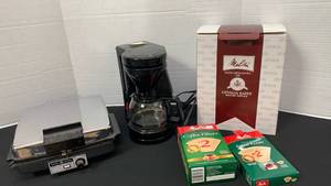 lot 1294 image: GE grill and Melina coffee maker