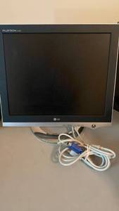 lot 1327 image: LG Flatron computer monitor with cords