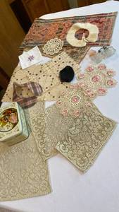 lot 1341 image: Vintage perfume bottles, doilies, collars, dresser scarves and Victorian style tin