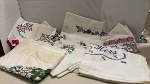 lot 1408 image: Embroidered Pillow Cases, 3 sets and 3 singles, Some stains
