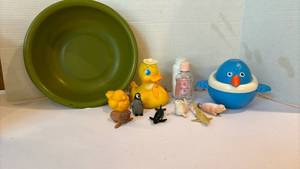 lot 1419 image: Plastic bowl with baby bath items