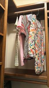 lot 1436 image: Four Tops size small and medium Two tshirts and two pullover blouses