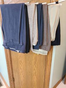 lot 1480 image: Mens pleated and cuffed dress slacks, sizes unknown.