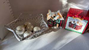 lot 3123 image: Metal basket with ornaments and ceramic votive candle holder
