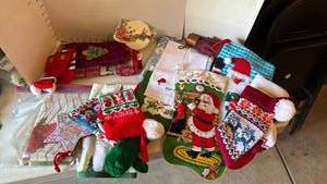 lot 3131 image: Holiday towels, tablecloths and stockings