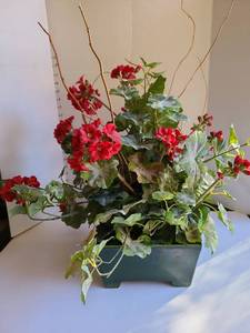 lot 3233 image: Ceramic flower pot with faux geraniums.