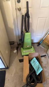 lot 3538 image: Panasonic upright vacuum with extra hose