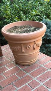 lot 4000 image: Large Plastic Terracotta Garden Planter with Floral Relief 18 inches tall, 19 12 inches across