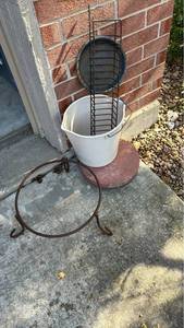 lot 4006 image: Metal Plant Stand with Wrought Iron Base, stepping stone and bucket