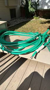 lot 4102 image: Garden Hose with Metal Fittings