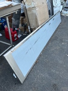 lot 27 image: Heavy Duty Professional Quality Stainless Steel Table Top - Double Sided - Great Utility Piece - Works shops  Docks for cutting fish etc