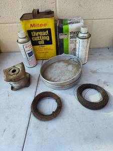 lot 97 image: Mitee Thread Cutting Oil and Wire Collection