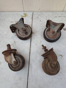 lot 135 image: Industrial Cast Iron Caster Wheels Set
