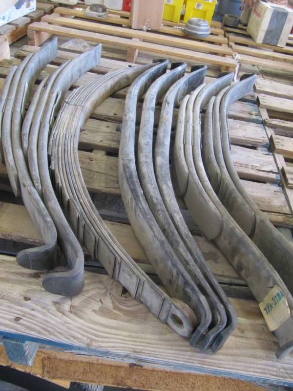 lot 990 image: 8 Trailer leaf springs 2) TRA 2726A,  3) TRA 021,  2)TRA2727,  1) unknown