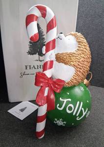 lot 4096 image: 14 inch Tall Holiday Hedgehog Decor, Adorable Hedgehog with Candy Cane & Bow Sitting on Jolly Ornament