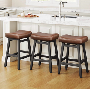 lot 561 image: Counter Height Bar Stools Set of 3, 24 Inch Barstools for Kitchen Counter, Kitchen Stools with Bonded Leather Saddle Seats & Heavy Duty Metal Legs, Easy Assembly, BrownBlack - Retail $0
