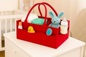 lot 36981 image: Baby Diaper Caddy Organizer �� Portable Felt Nursery Storage Bin with Handles, 7 Pockets & Removable Dividers for Diapers, Wipes, Toys �� Car & Home Use (Red) - Retail $0