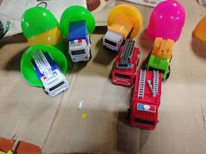 lot 28933 image: Set of 6 Easter Eggs with Emergency Vehicle Toys Inside