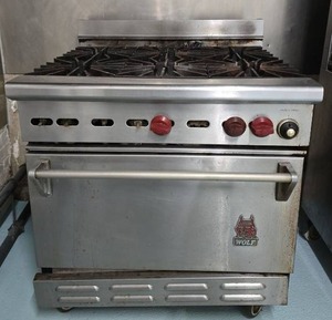 lot 5063 image: 34in- Wolf Commercial 6-Burner Natural Gas Range with Oven Model- CHSSG-6-29