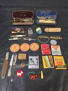 lot 210 image: Mid-Century Advertising Matchbooks, Ties Clips, Milk Bottle Tops, Eye Glasses, and Cracker Jack Toys