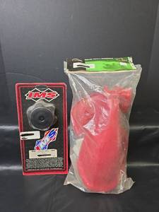 lot 295 image: IMS Motorcycle Gas Cap with Flat Seal - Black Vented and Arctic Cat Red Hand Guards